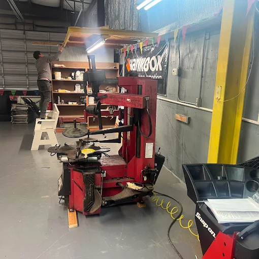 Tire changing equipment and workshop